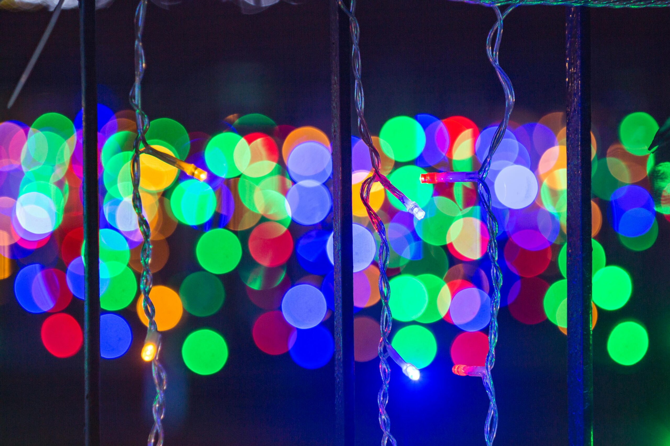 Vibrant bokeh of colorful Christmas lights creating a festive and joyful ambiance.